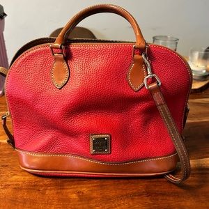 Dooney & Bourke nearly New!    RED nice mid size purse for anyone.  Leather